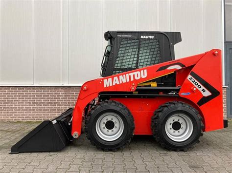 manitou skid steer loader price